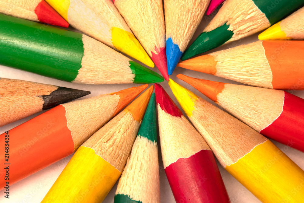 Colored pencils from above with points together Colored pencils from above with points together