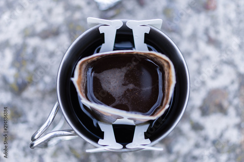 A cup of black coffee. View from above. photo