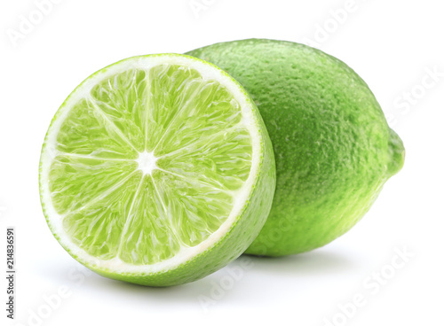 whole and cut lime fruits isolated on white background