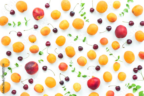 Fototapeta Naklejka Na Ścianę i Meble -  Healthy fresh fruit background with nectarine, peach, apricot, cherry, cherries on white background. Flat lay, top view