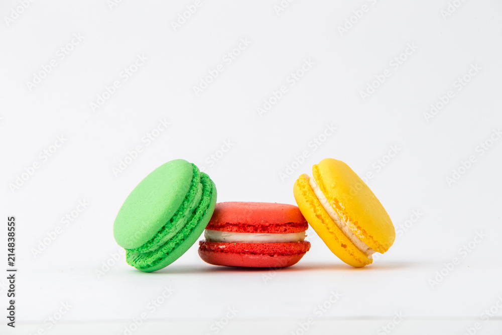 Cake macaron or macaroon isolated on white background, sweet and colorful dessert Cake macaron or macaroon isolated on white background, sweet and colorful dessert