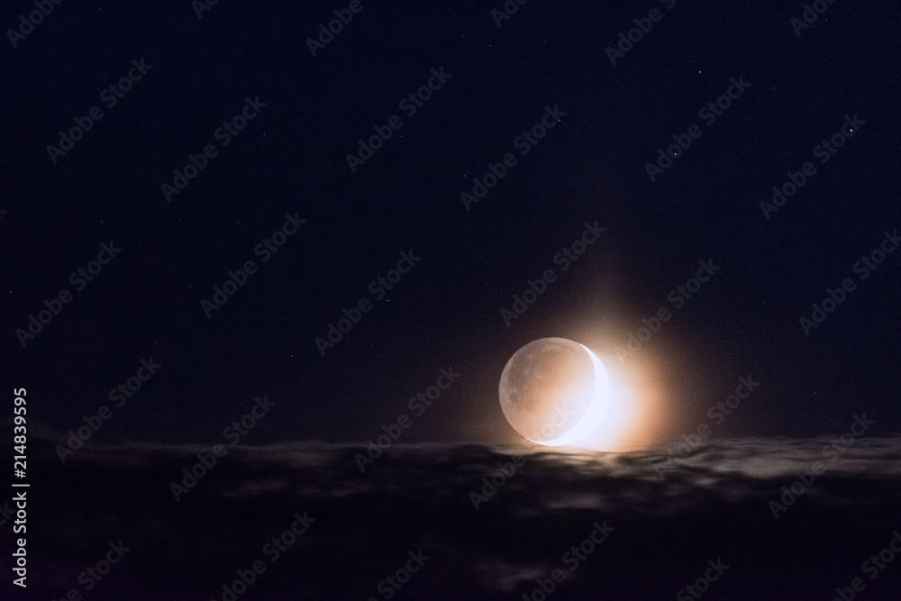 Obraz premium Moon above clouds