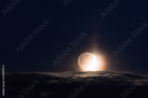 Moon above clouds