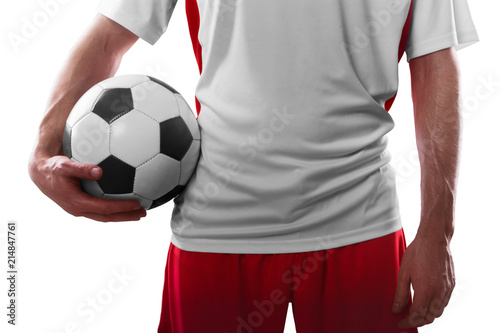 Professional soccer player holding soccer ball. Close-up. Isolated on white background © Ruslan Shevchenko