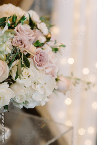 Flowers on a glass support.