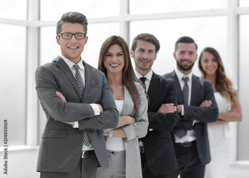 professional business team standing next to the office window professional business team standing next to the office window