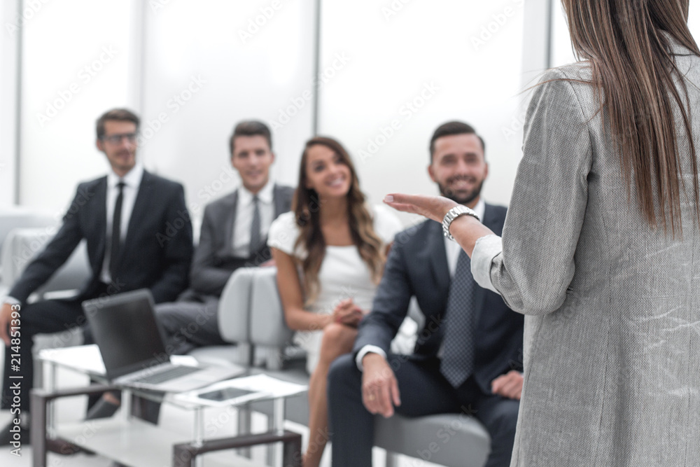 business woman makes a report for the business team business woman makes a report for the business team