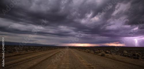 Panoramic views over the Tankwa Karoo Desert with dramatic thunderclouds in the sky photo