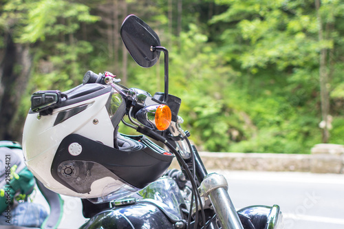 Helmet on the motorcycle handlebars