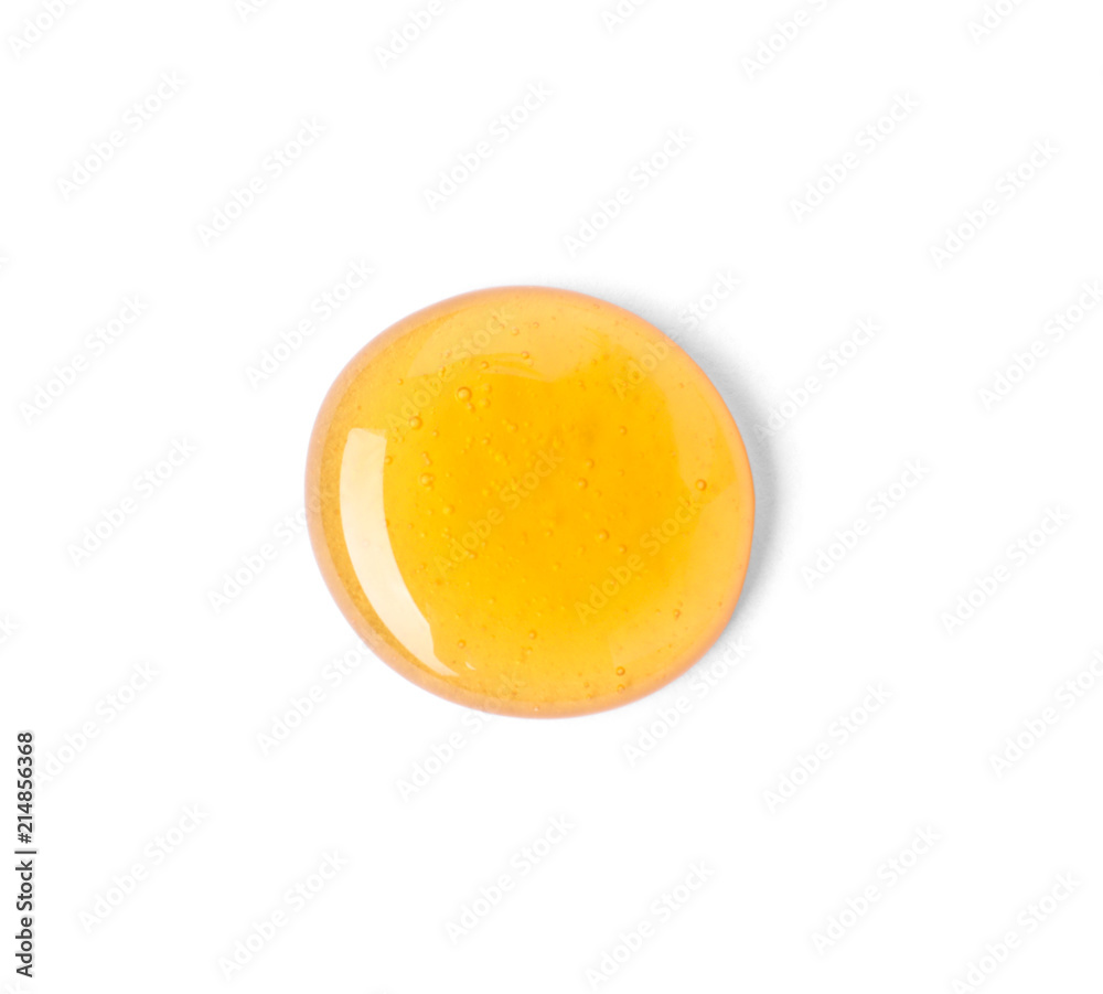 Drop of sweet honey on white background, top view Drop of sweet honey on white background, top view