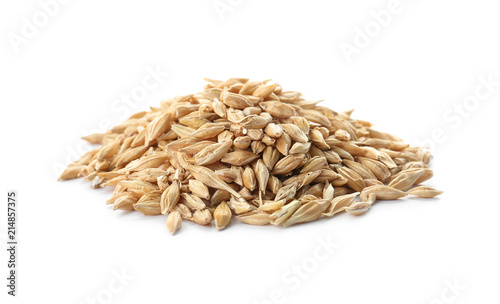 Raw barley on white background. Healthy grains and cereals
