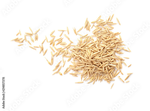 Raw oats on white background. Healthy grains and cereals