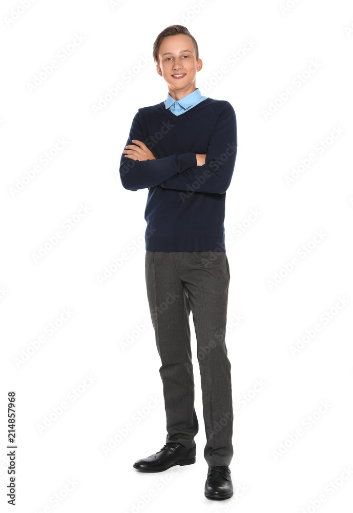 Teenage boy in stylish school uniform on white background Teenage boy in stylish school uniform on white background