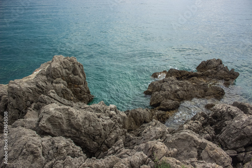 resort empty waterfront district of summer bright colorful nature scenery with stones and blue water surface