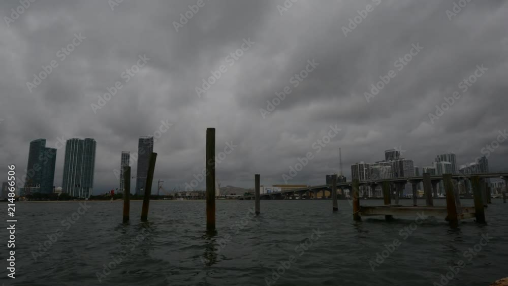 Dramatic time lapse of Miami city skyline on a stormy evening in Florida, USA Dramatic time lapse of Miami city skyline on a stormy evening in Florida, USA