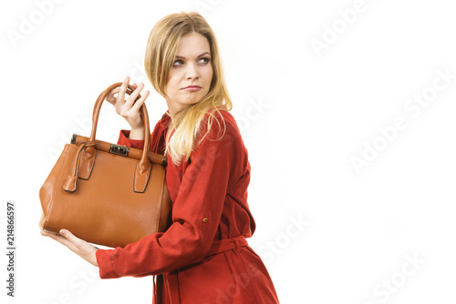 Woman protecting her handbag