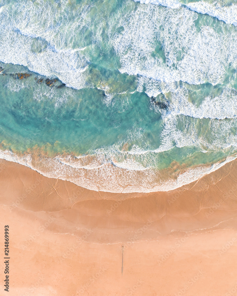 Aerial View of Waves and Beach Along Great Ocean Road, Victoria, Australia at Sunset