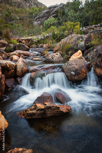 Close up wide angle image of a small waterfall in a freestone stream in the western Cape of south africa