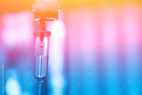 Set iv fluid intravenous drop saline drip hospital room,Medical Concept,treatment emergency and injection drug infusion care chemotherapy, concept.blue light background,selective focus 