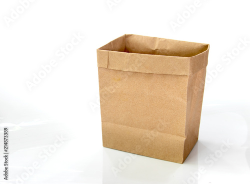 Brown paper bag isolated on white background