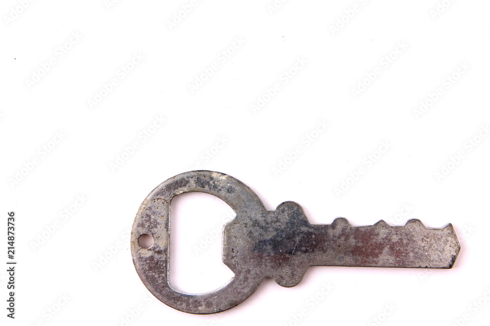 Key with white backdrop in studio. Key with white backdrop in studio.