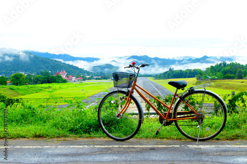 bicycle near Airport runway with mountain in countryside