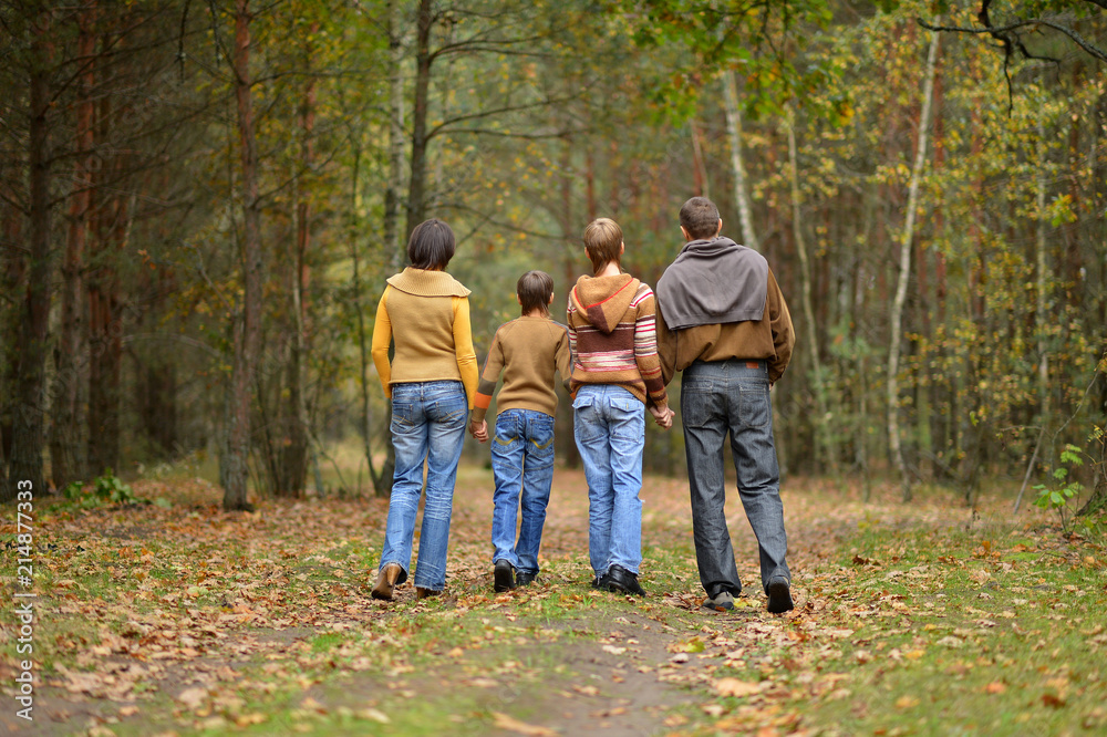 Family of four in park