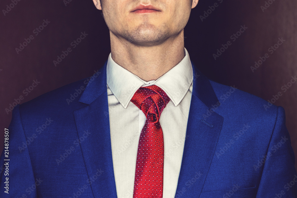 Man in white shirt, blue jacket and red tie Stock Photo | Adobe Stock