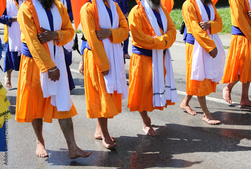 Sikh barefoot warriors dressed in orange