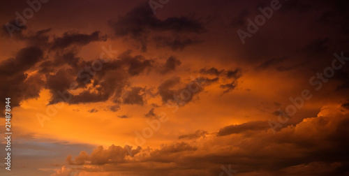 Red cloudy sky at sunset, copy space, wallpaper.