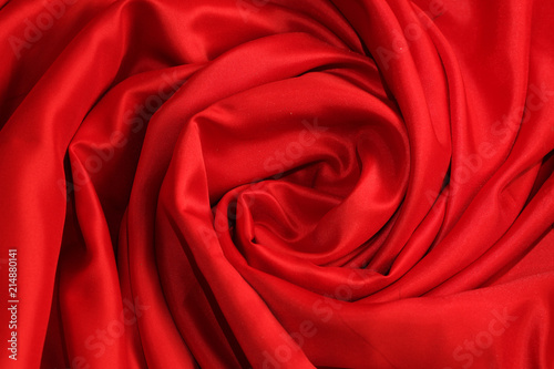 Fashion style. Red fabric close up background.