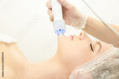 Facial spa cosmetology procedure. Skin care lift anti age