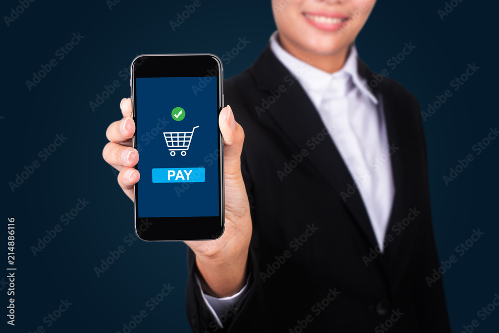 Payment completed message on a mobile phone screen. Woman showing her mobile phone Payment completed message on a mobile phone screen. Woman showing her mobile phone