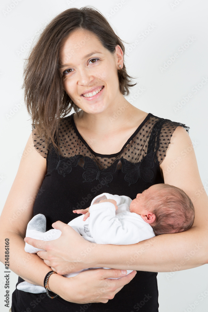 pretty cheerful mother with newborn baby son pretty cheerful mother with newborn baby son
