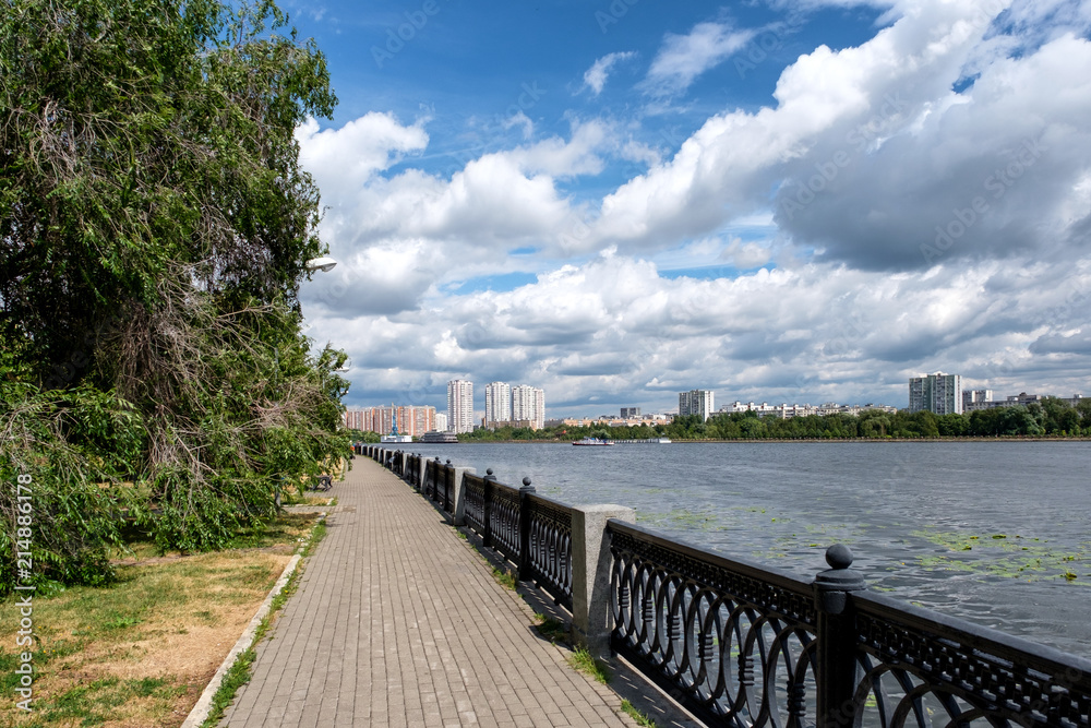 City landscape with a river and embankment. Moscow, Russia