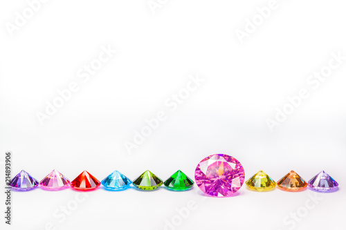 amethyst  diamonds and colorful diamonds in white background with copy space photo