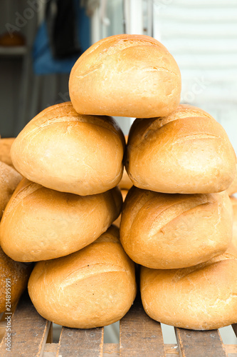 Tasty bread on shelf in bakery