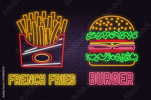 Retro neon burger and french fries sign on brick wall background. Design for cafe, restaurant.