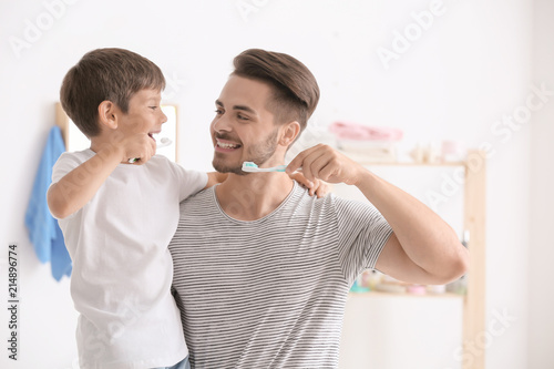 Little boy and his father b...