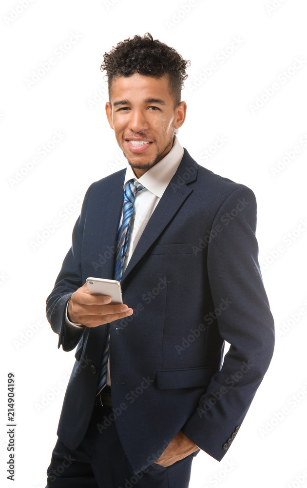 Handsome African-American businessman with mobile phone on white background Handsome African-American businessman with mobile phone on white background