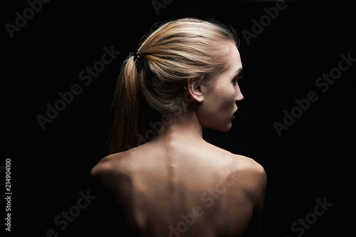 young woman with naked back