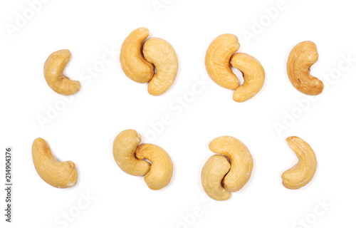 Salted cashew nuts isolated on white background, top view