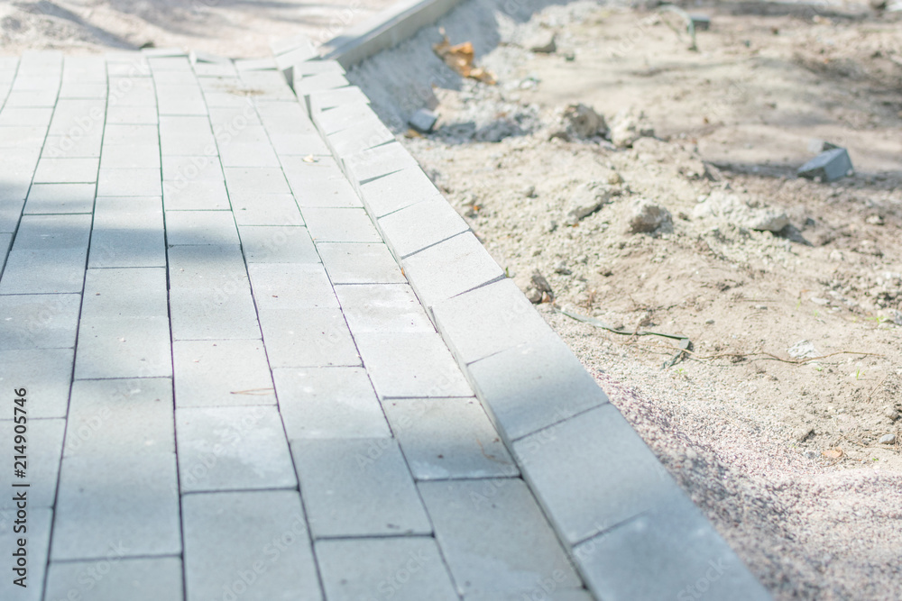 Fototapeta premium Laying of paving slabs.