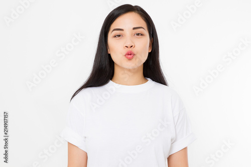 Young asian girl kiss isolated on white background. Copy space. Mock up. Summer woman clothes blank template white t shirt. Skin care