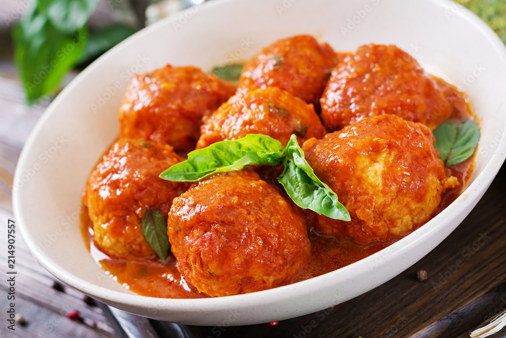 Meatballs in tomato sauce and toast with basil pesto. Dinner. Tasty food. Meatballs in tomato sauce and toast with basil pesto. Dinner. Tasty food.