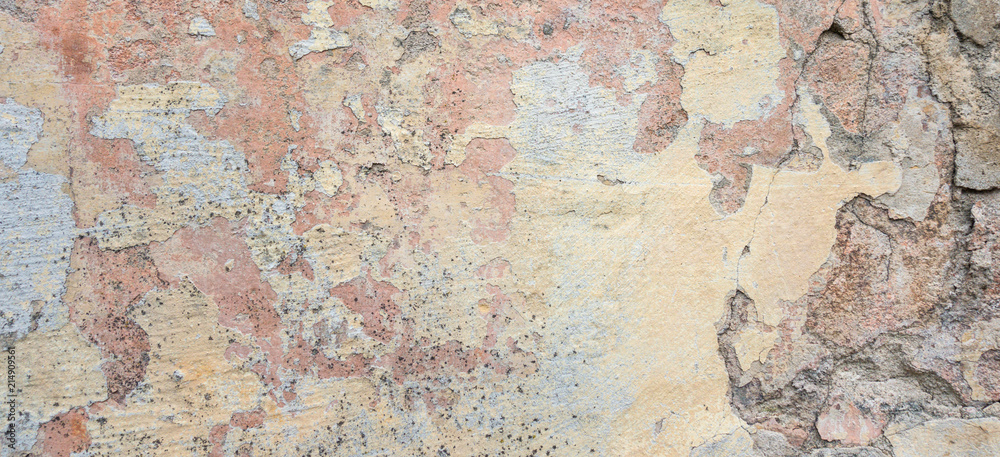 Fototapeta premium Old Wall With Peel Grey Stucco Texture. Retro Vintage Worn Wall Background. Decayed Cracked Rough Abstract Banner Surface.