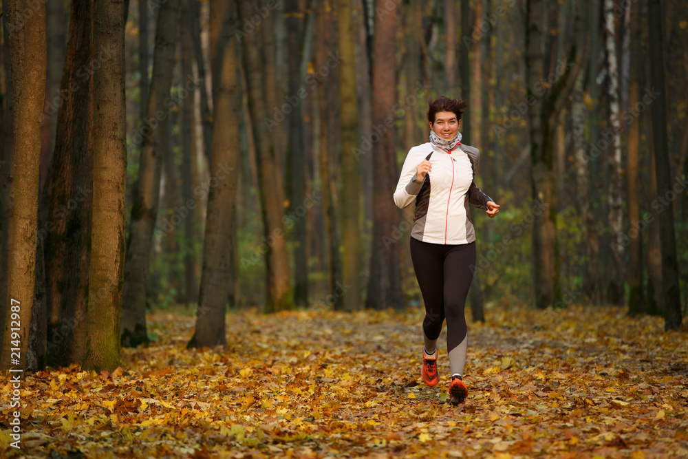 Full-length photo of woman on morning run Full-length photo of woman on morning run