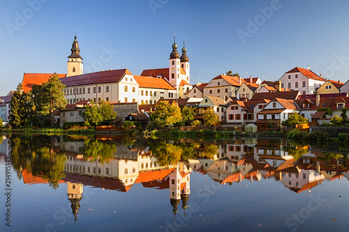 View of Telc across pond with reflections, southern Moravia, Czech Republic. photo