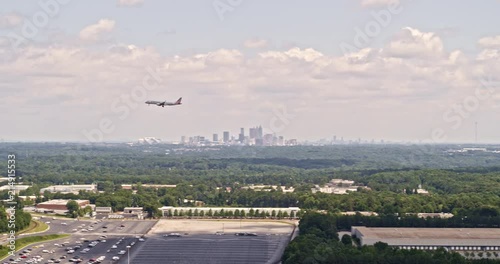 Atlanta Aerial v452 Panning view of airplane arrival with cityscape view in distance 6/18 photo