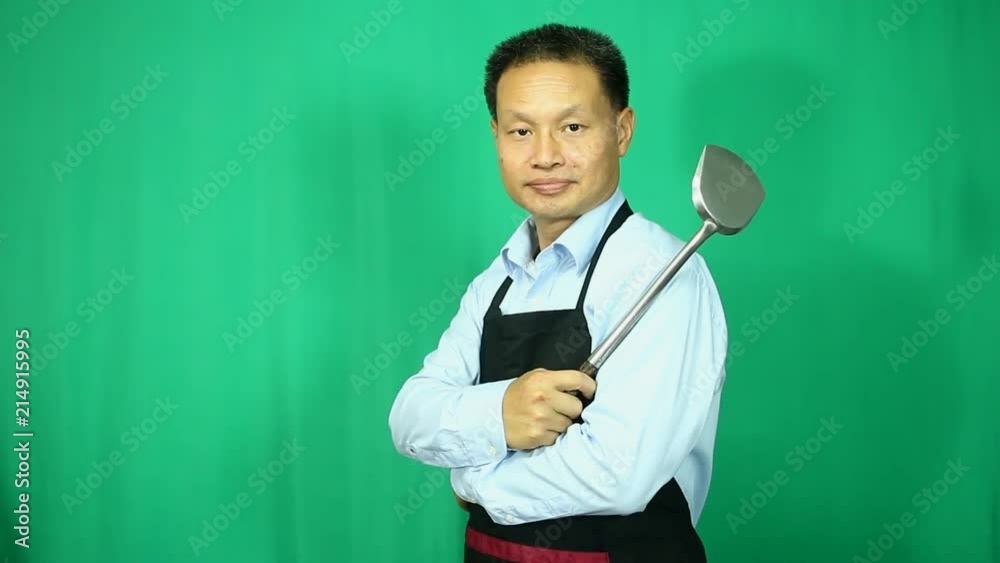 Thai chef acting with green screen Thai chef acting with green screen